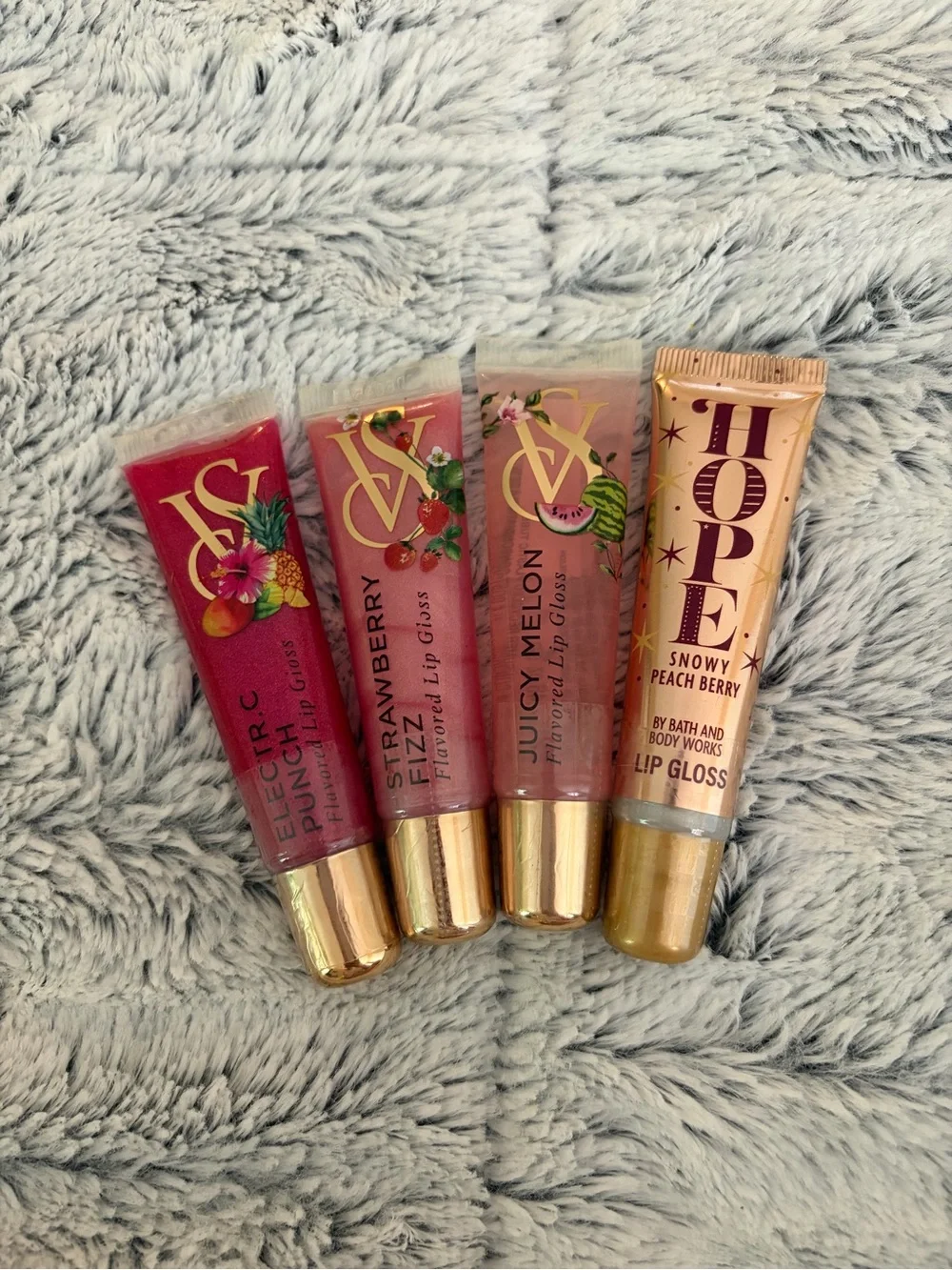 4 brand new lipglosses